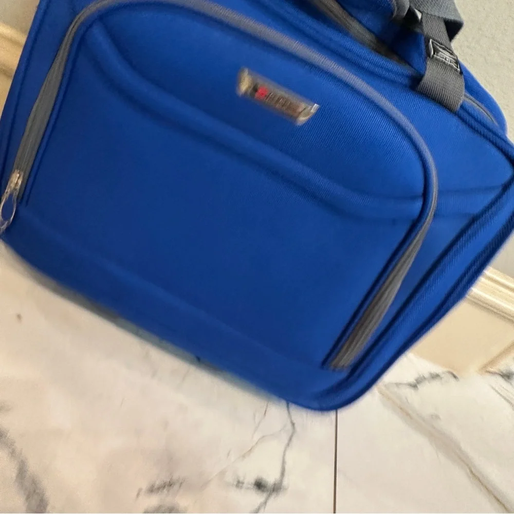 Delsey Underseat Carry On Rolling Tote Blue Softside Travel Bag
